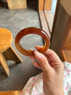 D: Đỏ mật (54.7)